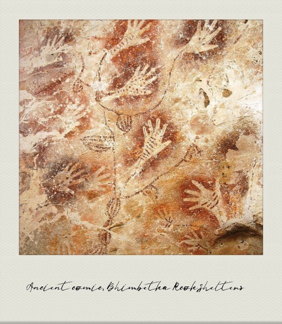 Photograph: hand stencils and figures at Bhimbetka.