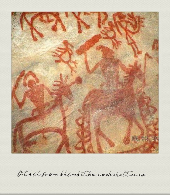 Photograph: red ochre figures from the Bhimbetka rock shelters.